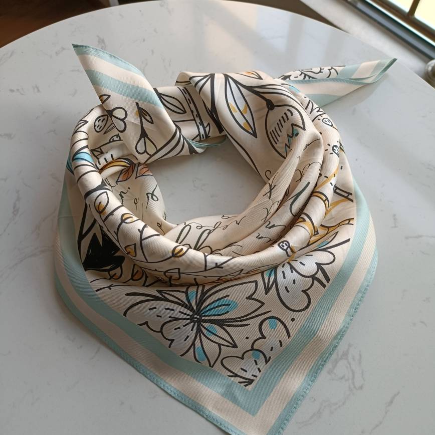 This bookish silk scarf is a beautiful tribute to Jane Austen's classic novel, Pride and Prejudice. It features an inspiring quote from the novel. Literary Scarf, Bookish scarf
